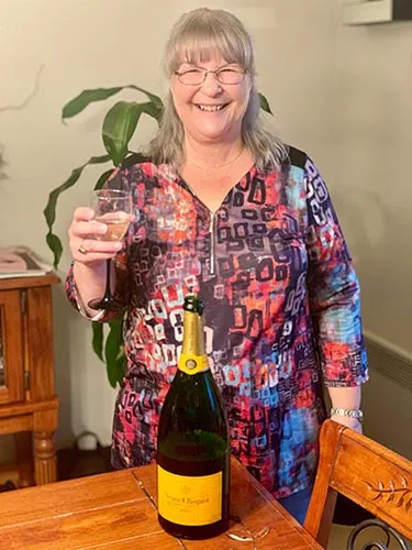 S.G. celebrating with champagne
